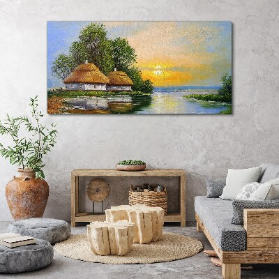 Tableau toile imprimée Un coucher de soleil paisible sur le village