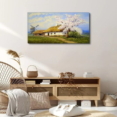 Tableau sur toile Paysage rural avec un moulin à vent et des fleurs
