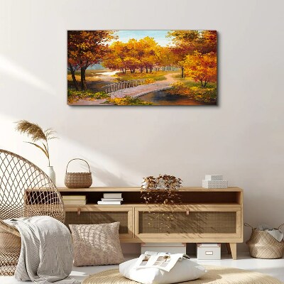 Tableau sur toile Pont doré dans le parc d'automne