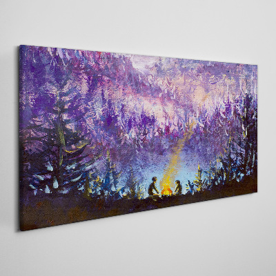 Tableau sur toile La magie d'un feu de camp en soirée dans la forêt