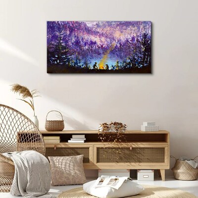 Tableau sur toile La magie d'un feu de camp en soirée dans la forêt