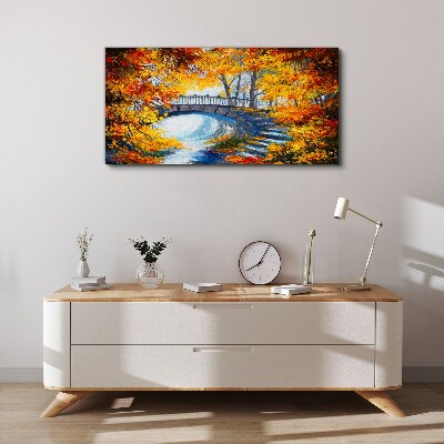 Tableau sur toile Pont doré dans le parc d'automne