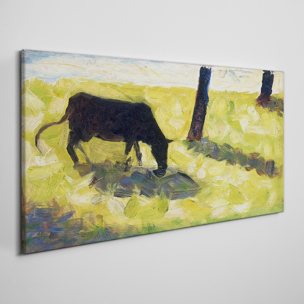 Tableau toile imprimée Une vache broutant dans un paysage verdoyant