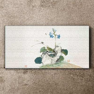 Tableau imprimé sur toile Une fleur sur un fond de pierre