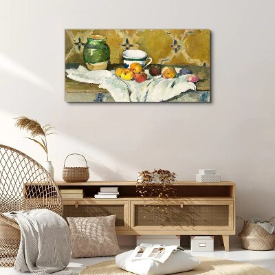 Tableau sur toile Table de fruits avec un pot vert