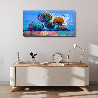 Tableau imprimé sur toile Arbres colorés sur fond bleu