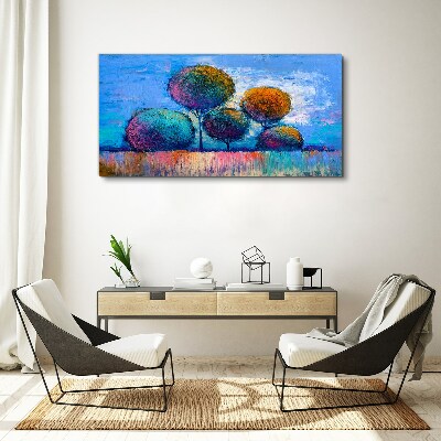 Tableau imprimé sur toile Arbres colorés sur fond bleu