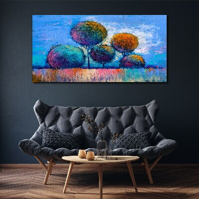 Tableau imprimé sur toile Arbres colorés sur fond bleu