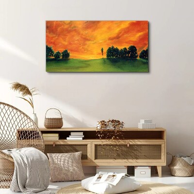 Tableau imprimé sur toile Coucher de soleil sur une colline verdoyante