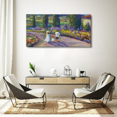 Tableau sur toile Une promenade en famille dans un jardin coloré