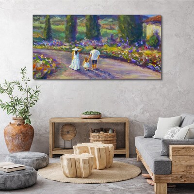 Tableau sur toile Une promenade en famille dans un jardin coloré