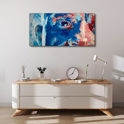 Tableau imprimé sur toile Visage intense aux nuances bleues