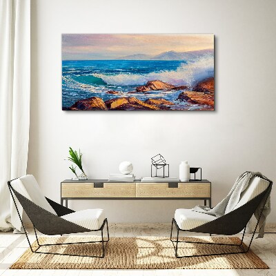 Tableau sur toile Vagues sur la côte au coucher du soleil