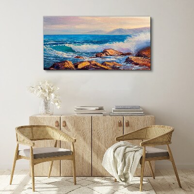 Tableau sur toile Vagues sur la côte au coucher du soleil