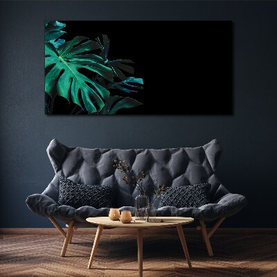 Tableau sur toile Feuilles vertes sur fond noir