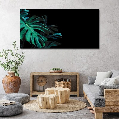Tableau sur toile Feuilles vertes sur fond noir