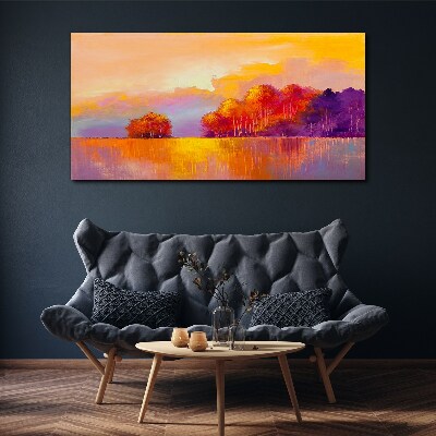 Tableau sur toile Coucher de soleil coloré sur la prairie