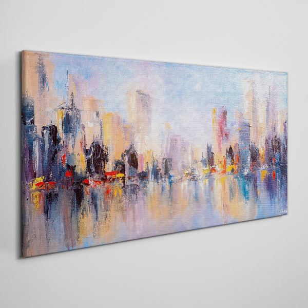Tableau sur toile La ville dans la lueur du coucher du soleil