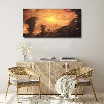 Tableau sur toile Coucher de soleil au-dessus des nuages