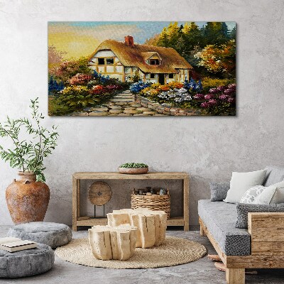 Tableau toile imprimée Un charmant cottage de campagne entouré de fleurs