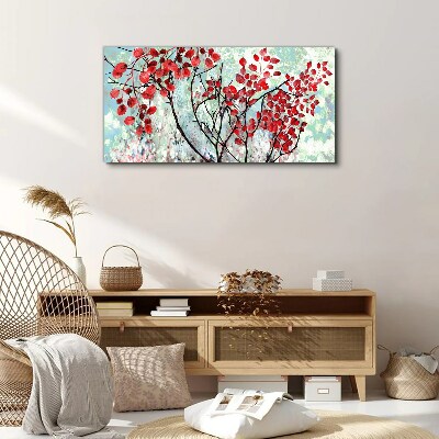 Tableau sur toile Feuilles rouges sur fond bleu