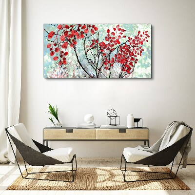 Tableau sur toile Feuilles rouges sur fond bleu