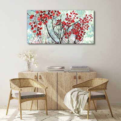 Tableau sur toile Feuilles rouges sur fond bleu