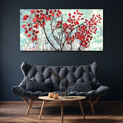 Tableau sur toile Feuilles rouges sur fond bleu