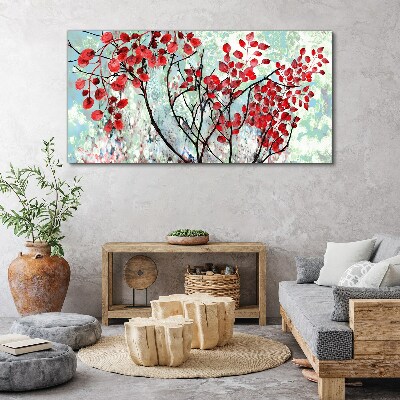 Tableau sur toile Feuilles rouges sur fond bleu