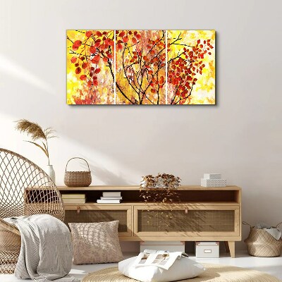 Tableau imprimé sur toile Feuilles d'automne sur fond jaune