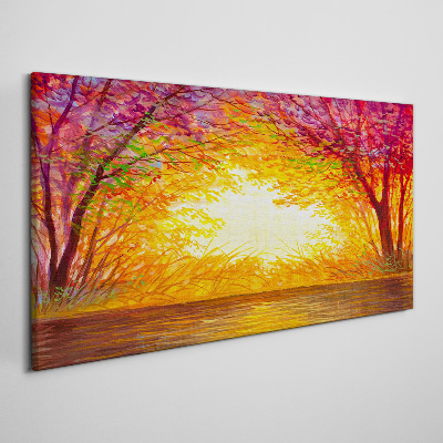 Tableau sur toile Coucher de soleil dans une forêt colorée