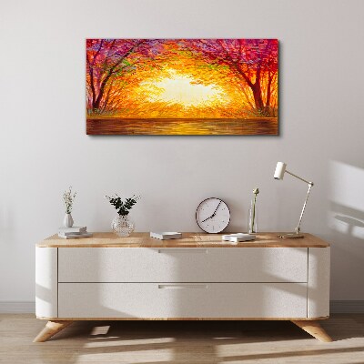 Tableau sur toile Coucher de soleil dans une forêt colorée