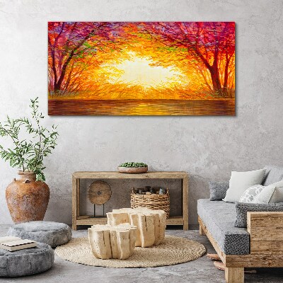 Tableau sur toile Coucher de soleil dans une forêt colorée
