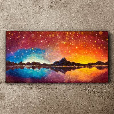 Tableau sur toile Coucher de soleil sur un lac de montagne