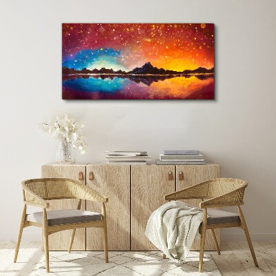 Tableau sur toile Coucher de soleil sur un lac de montagne