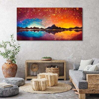 Tableau sur toile Coucher de soleil sur un lac de montagne
