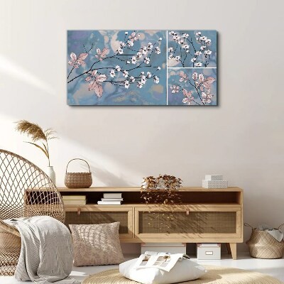 Tableau imprimé sur toile Branches florales sur fond bleu