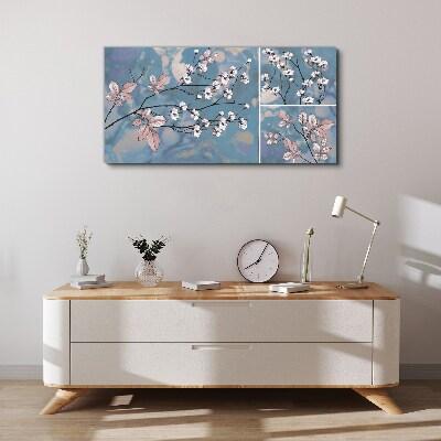 Tableau imprimé sur toile Branches florales sur fond bleu