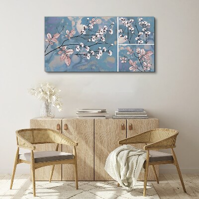 Tableau imprimé sur toile Branches florales sur fond bleu