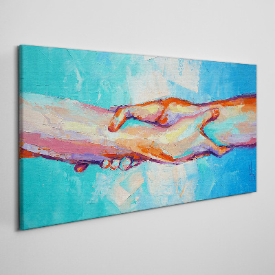 Tableau toile imprimée Unir les mains en couleur