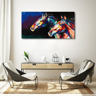 Tableau imprimé sur toile Chevaux colorés en mouvement