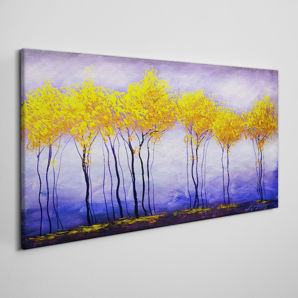 Tableau sur toile Des arbres dorés dans un paysage violet