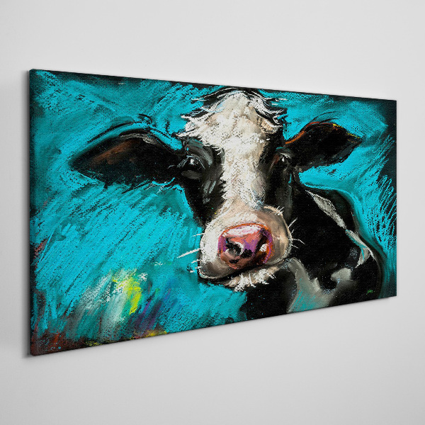 Tableau toile imprimée Portrait d'une vache sur fond bleu