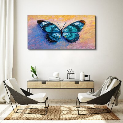 Tableau sur toile Papillon bleu sur fond pastel