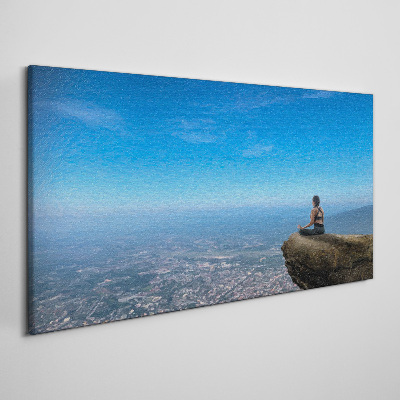 Tableau sur toile Méditation au sommet de la montagne