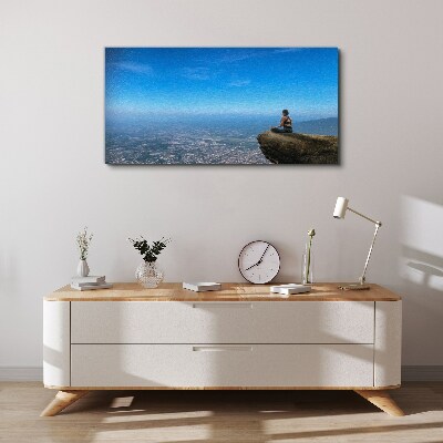Tableau sur toile Méditation au sommet de la montagne