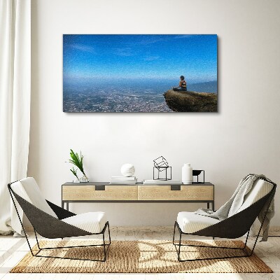 Tableau sur toile Méditation au sommet de la montagne