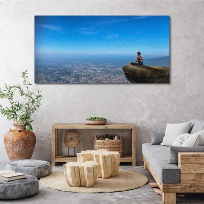 Tableau sur toile Méditation au sommet de la montagne