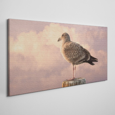 Tableau sur toile Gardien ailé dans les nuages