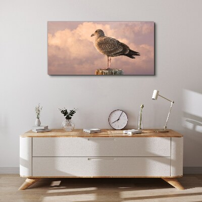 Tableau sur toile Gardien ailé dans les nuages